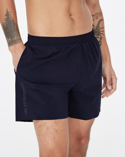 Work Running 5" Short in Navy, lifestyle
